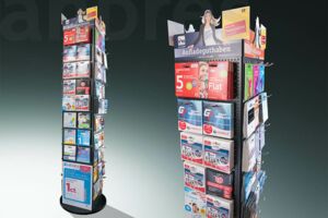 Rotating floor sales stand with perforated wall hooks for arranging products and exchangeable magnetic screens as a topper.