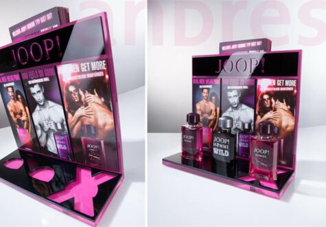 Tester display for JOOP! made of pink back-printed and black acrylic surfaces. Laser cuts in the black areas clearly show off the underlying pink. A brochure holder is located on the back.